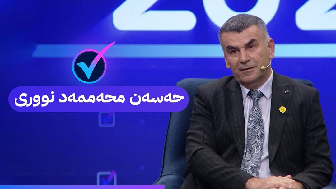 بە کاندیدیی لەگەڵ حەسەن محەممەد نووری